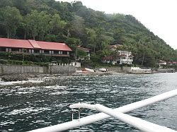 Anilao - Eagle Point beach resort; met de boot naar de duikstek