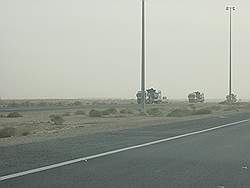 De weg naar Irak - de grensovergang tussen Kuwait en Irak; tanks op weg naar Irak