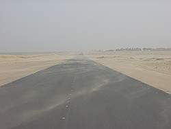 De weg naar Irak - op de weg terug; kleine zandstorm
