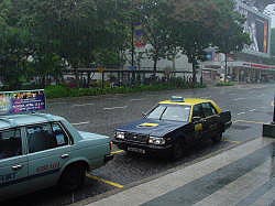 Singapore - Boat quay; een tropische regenbui