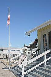 Galveston - de 'Murdoch's bathhouse' pier met kapiein Haak
